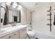 Bathroom featuring a vanity with a sink, toilet, and a combined tub and shower at 5842 Peregrine Ave # C01, Orlando, FL 32819