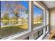 Stunning water view from large windows, creating a bright and airy atmosphere with natural light at 5842 Peregrine Ave # C01, Orlando, FL 32819