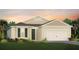 Charming single-story home featuring a two-car garage, manicured lawn, and classic architectural details at 6319 Dew Drop Loop, St Cloud, FL 34771