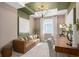 Cozy home office with comfortable seating, modern decor, and a functional work area at 6319 Dew Drop Loop, St Cloud, FL 34771