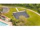 Aerial view of a shuffleboard court next to a pool and other amenities at 8722 Hastings Beach Blvd, Orlando, FL 32829