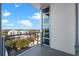 Balcony overlooking the city skyline with glass railings at 101 S Eola Dr # 1001, Orlando, FL 32801