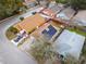 Aerial view of neighborhood homes, showing rooftops, solar panels and street views at 1201 City Park Ave, Orlando, FL 32808