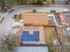 Aerial view of neighborhood homes, showing rooftops, street views and fenced yards at 1201 City Park Ave, Orlando, FL 32808