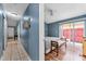 Hallway view into spacious main bedroom with sliding glass doors to patio at 1201 City Park Ave, Orlando, FL 32808