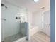 Modern bathroom with glass shower, soaking tub, and contemporary fixtures at 14501 Grove Resort Grove Resort Ave # 3733, Winter Garden, FL 34787
