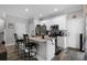 Kitchen with granite countertops, stainless steel appliances, and an island with bar stool seating at 149 E Muriel St, Orlando, FL 32806