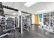 Bright fitness center featuring modern equipment, rubber flooring, and access to natural light at 150 E Robinson St # 209, Orlando, FL 32801