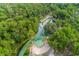 Aerial view of Kelly Park surrounded by lush forest and turquoise water, offering scenic views at 1546 Park Leah Cir, Apopka, FL 32712