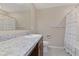 Well-lit bathroom with a large vanity, sink, and shower-tub combination at 1546 Park Leah Cir, Apopka, FL 32712