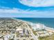 Beautiful aerial view showcases the beach, blue ocean, and coastal community at 1575 Ocean Shore Blvd # 306, Ormond Beach, FL 32176