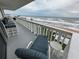 Relax on this beautiful balcony with comfortable seating and stunning ocean views at 1575 Ocean Shore Blvd # 306, Ormond Beach, FL 32176