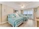 Bedroom with two queen beds, and shutters to the balcony overlooking the ocean at 1575 Ocean Shore Blvd # 306, Ormond Beach, FL 32176