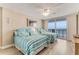 Bedroom with two queen beds and balcony overlooking the ocean at 1575 Ocean Shore Blvd # 306, Ormond Beach, FL 32176