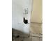 Damaged drywall with a large hole and cracks near an electrical switch at 1606 26Th St, Orlando, FL 32805