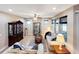 Comfortable living room featuring tile floors, comfortable couches, and lots of natural light at 172 Balmy Coast Rd, Groveland, FL 34736