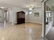 Bright and airy living room with tile flooring and large windows at 172 Balmy Coast Rd, Groveland, FL 34736