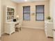 Bright office space with built-in shelving and natural light, ideal for remote work at 172 Balmy Coast Rd, Groveland, FL 34736