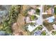 Aerial shot featuring homes, cul-de-sac, and scenic landscaping at 1739 Nectarine Trl, Clermont, FL 34714