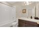 Full bathroom features a tub, shower, a vanity with storage, and modern fixtures at 2041 Lobelia Dr, Lake Mary, FL 32746