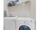 Functional laundry area features a washer and dryer at 2041 Lobelia Dr, Lake Mary, FL 32746