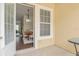 Patio view looking inside to dining room and kitchen at 2041 Lobelia Dr, Lake Mary, FL 32746