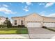 Charming single-story home featuring a tile roof, brick driveway, and well-manicured lawn at 2865 Eastham Ln, Kissimmee, FL 34741