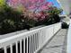 This outdoor balcony features painted wood railings and ample space at 423 Ololu Dr, Winter Park, FL 32789