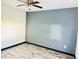 Bedroom featuring a ceiling fan and a two-tone paint scheme with updated flooring at 423 Ololu Dr, Winter Park, FL 32789