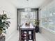 Spacious dining room featuring a large table with built in wine rack and view of outside at 4820 Battaglia Blvd, St Cloud, FL 34769