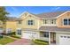 Beautiful two-story home featuring a two car garage, brick driveway, and nicely maintained landscaping at 4820 Battaglia Blvd, St Cloud, FL 34769