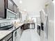 Bright kitchen featuring stainless steel appliances and plenty of counter space at 4820 Battaglia Blvd, St Cloud, FL 34769