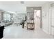 Bright, open-concept living room featuring tile floors, neutral walls, and comfortable seating at 4820 Battaglia Blvd, St Cloud, FL 34769