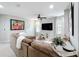 Inviting living room with plush seating, bright windows, and a cozy atmosphere for relaxation and entertainment at 4820 Battaglia Blvd, St Cloud, FL 34769