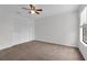 Bright bedroom with ceiling fan and a spacious closet at 486 Abba St, Altamonte Springs, FL 32714