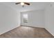 Spacious carpeted bedroom with natural light and ceiling fan at 486 Abba St, Altamonte Springs, FL 32714