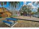 The neighborhood playground has a picnic table and a swing set under mature trees at 486 Abba St, Altamonte Springs, FL 32714