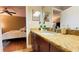 Bathroom featuring granite countertops with bedroom view at 5017 City St # 1932, Orlando, FL 32839