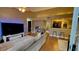 Bright open-concept living area features wood floors and seamless flow to kitchen and other living spaces at 5017 City St # 1932, Orlando, FL 32839