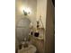 Stylish powder room vanity with decorative lighting and modern sink with updated fixtures at 554 Pinebranch Cir, Winter Springs, FL 32708