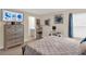 Bedroom featuring neutral walls, a tv and dressers at 565 Big Pine Ave, Minneola, FL 34715