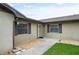 Inviting entrance with a well-lit walkway and neatly trimmed landscaping at 620 Wexford Ct, Winter Haven, FL 33884