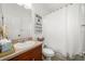 Bright bathroom features stylish vanity, neutral tile, and decorative accents at 707 Brandy Oaks Loop, Winter Garden, FL 34787