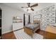 Bedroom with a bed, camera wallpaper, ceiling fan, rug, and dark window shutters at 707 Brandy Oaks Loop, Winter Garden, FL 34787