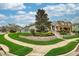 Beautiful home with lush landscaping, manicured lawn, and elegant architectural details at 707 Brandy Oaks Loop, Winter Garden, FL 34787