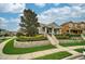 Charming single-story home with manicured lawn and stone accents, showcasing curb appeal and inviting entrance at 707 Brandy Oaks Loop, Winter Garden, FL 34787