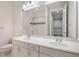 Upstairs bathroom featuring dual sinks, bright white cabinets, and shower/tub combination at 8742 European Fan Palm Aly, Winter Garden, FL 34787