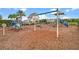 Community playground with swings, slides, and climbing structures, perfect for Gathering fun at 8742 European Fan Palm Aly, Winter Garden, FL 34787