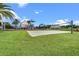 Community sand volleyball court next to playground and close to residential neighborhood at 8742 European Fan Palm Aly, Winter Garden, FL 34787