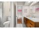 Bathroom featuring wood cabinets and sink at 9308 Thurloe Pl, Orlando, FL 32827